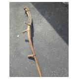 Rusty Scythe with Wooden Handle