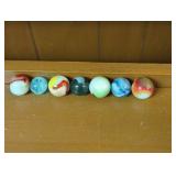 Seven Glass Marbles