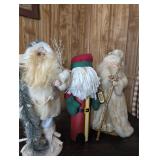 Three Santa Figures