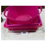 Three Pink Plastic Containers