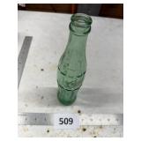 Green Glass Cola Bottle