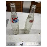 Two Glass Pepsi Bottles
