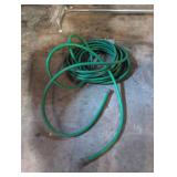 Coiled Green Garden Hose