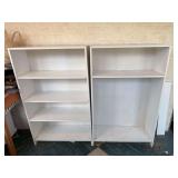 Two white bookcases or shelving units with removable adjustable shelves (48” x 30” x 12”)