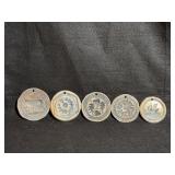 Set of Five Glazed Ceramic Medallions or Tiles, Each with a Different Design