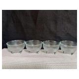 Set of vintage three-footed pebbled glass snack bowls