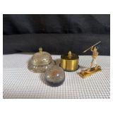 Desktop Items:  Vintage Postage Stamp Roll Dispenser, Vintage Desktop Service Bell, Dandelion Paperweight, and Miniature of King Tut on Papyrus Boat