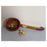 Japanese Netsuke carving of Smiling Buddha, and a Russian Khokhloma Ladle