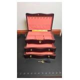 Small flip top two drawer jewelry box with key