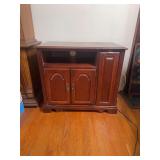 Cherry wood TV stand with VCR storage