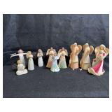 Three collections of angel figurines