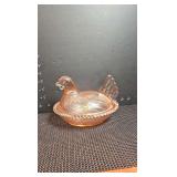 Pink or peach glass 'Hen on Nest' covered candy dish