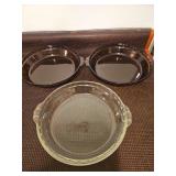 Three glass Pyrex pie plates, two 9.5in and one 10in
