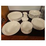 Mikasa dinnerware. Incomplete, six dinner plates, 7 salad plates, 8 soup bowls, 8 saucers, platter, sugar and creamer and serving bowl.