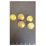 Replicas of US artillery bridle rosettes.