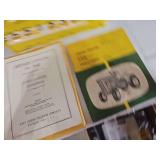 Collection of John Deere tractor manuals and stickers