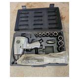 Central pneumatic impact and wrench combination with sockets. Not tested.