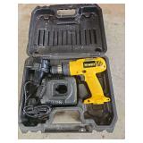 DeWalt adjustable clutch cordless VSR drill. Not tested.
