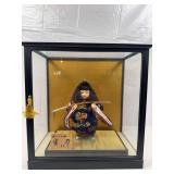 vintage Japanese Samurai boy doll (10”) in a glass display case