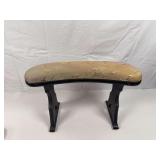vintage Japanese Kyosoku armrest featuring a crescent-shaped top with a decorative fabric cushion on a black wood base.