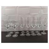 Four wine glasses, six champagne flutes, and a souvenir champagne flute from New Year’s Eve 1999-2000 “Century’s End” military ball at Camp Zama, Japan