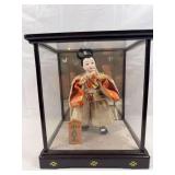 Vintage Japanese warrior doll (10”) in glass display case