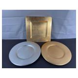 Three decorative charger plates ￼
