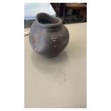 Very Old Crooked Unglazed Pottery with Indention