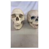 Pair of Plastic Head Skulls