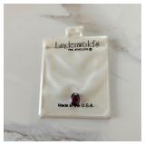 Burgundy gemstone from Lindenwold Fine Jewelers