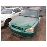 2000 Hyundai Accent KMHCG45G1YU052789 Green