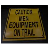 Caution Men Equipment on Trail Sign