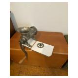 Vintage cast iron Reliance hand-crank meat grinder