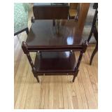 Vintage colonial-style mahogany rolling end table
