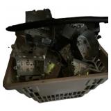 basket of loose metal electrical boxes