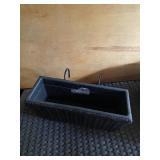 Black wicker balcony planter