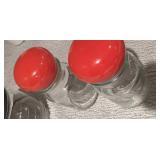 Vintage apothecary jars bubble red