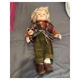 vintage autumn-themed boy porcelain doll