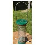 Hanging metal mesh bird feeder designed for seeds
