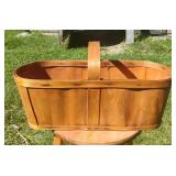 Vintage wooden harvest or gathering basket