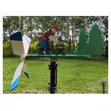 Traditional wooden lumberjack sawing whirligig