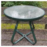 Green round outdoor side table