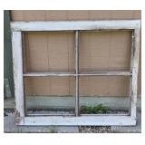 Salvaged vintage four-pane wooden window