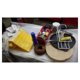 Tire chock, wire, hanger for boxed gloves
