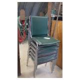 6 metal stacking chairs