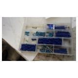 Tapcon screws in container