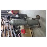 Empty tank on rolling tank cart