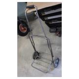 Grocery cart, wilson tennis racket, &