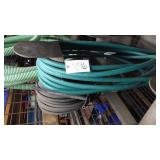 Green Garden hose & black pressure hose