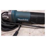 Makita 9557PB 4 1/2' Angle Grinder- running